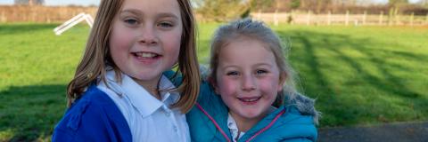 Two girls on the school field