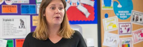 Head teacher speaks to her class